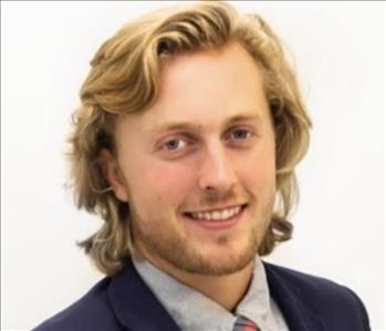 Young man with a jacket and tie on