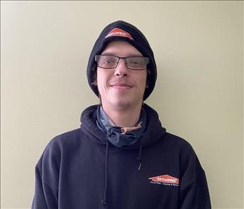 Young man standing with a Servpro sweatshirt on