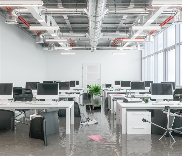 a flooded office with water covering the floor